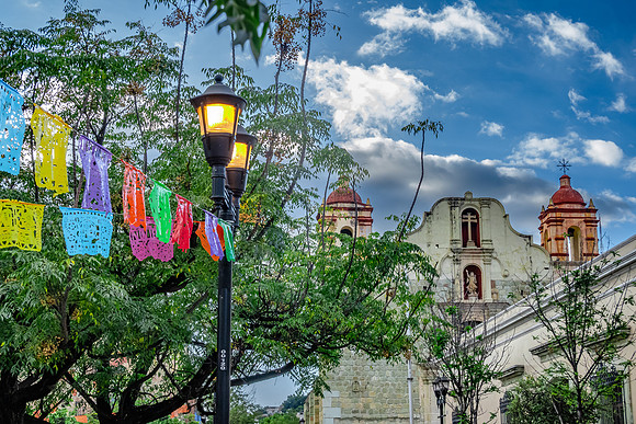 Banners fly near Templo de Santo Domingo, Oaxaca