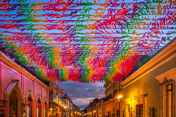 Banners over Calle Macedonio Acala, Oaxaca