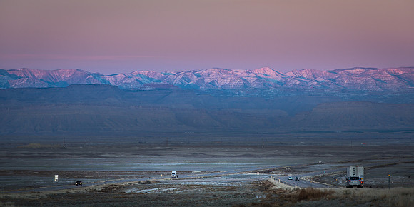 The Road Goes on Forever; I-70 Sunset West of Moab Utah