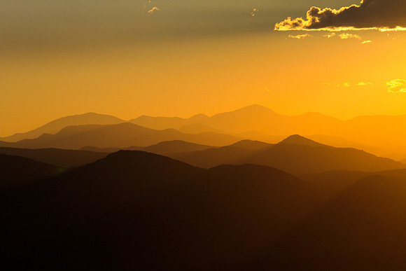 Golden Mountains, clouds,  Front Range Sunset